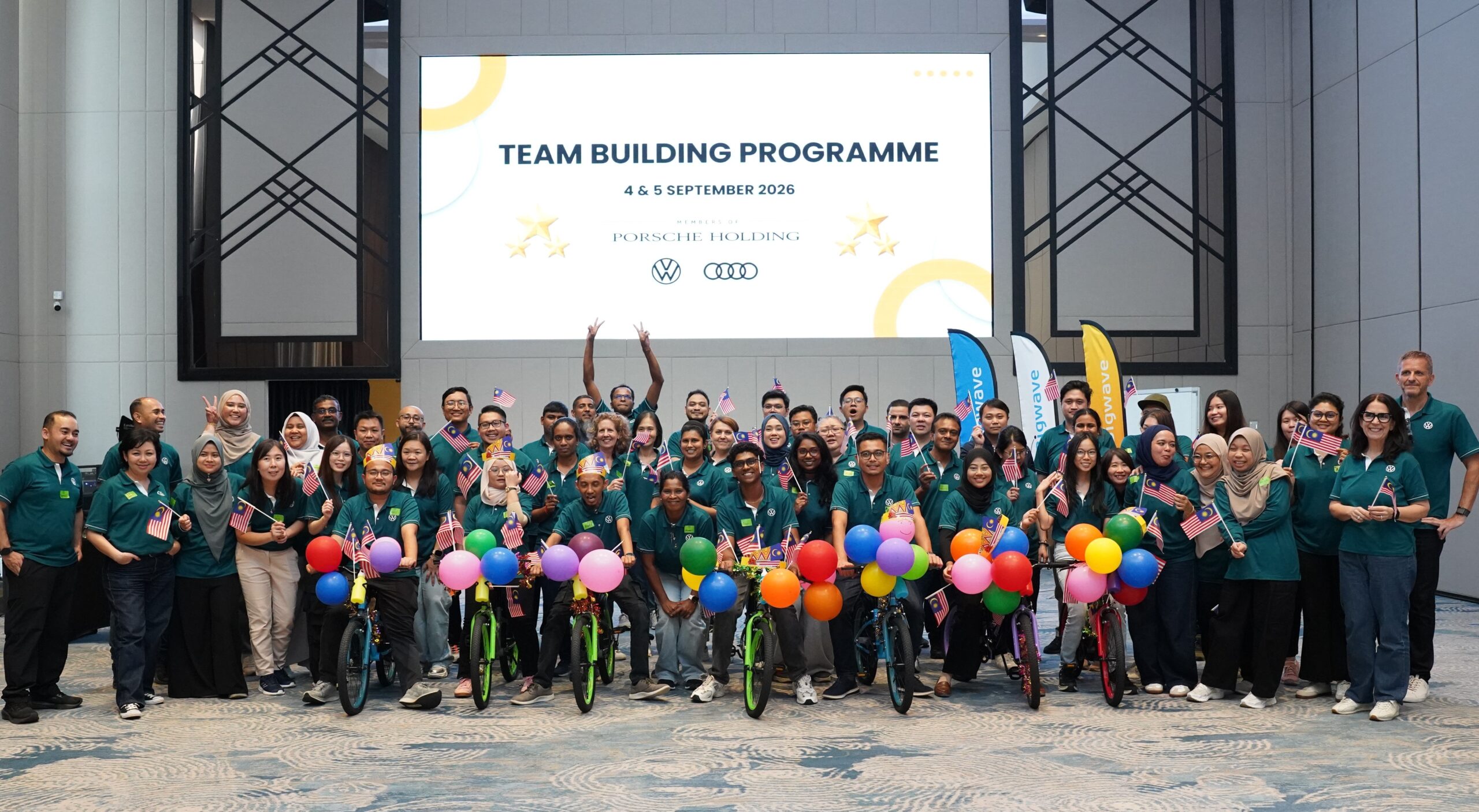 CSR team building Malaysia – corporate team participating in a Build-A-Bike challenge with Asia Bigwave